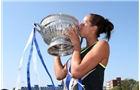 EASTBOURNE, ENGLAND - JUNE 21:  Madison Keys of USA celebrates with the trophy after beating Angelique Kerber of Germany during their Women's Finals match on day eight of the Aegon International at Devonshire Park on June 21, 2014 in Eastbourne, England. (Photo by Jan Kruger/Getty Images)